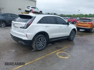 2024 Cadillac XT4 AWD Sport with VIN 1GYFZFR40RF223782, listed as a IAAI auction lot 42295745 with 7,254 mi miles and . Bid and sale history available at DreamBid. Image 4.