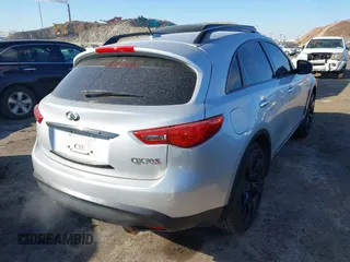 2015 Infiniti QX70 with VIN JN8CS1MW6FM482894, listed as a IAAI auction lot 41671236 with 106,599 mi miles and . Bid and sale history available at DreamBid. Image 4.