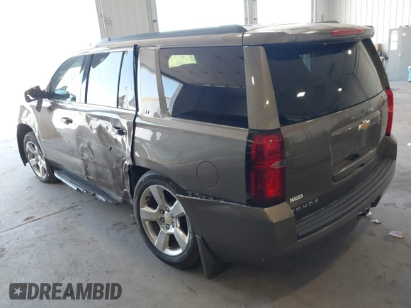 2016 Chevrolet Tahoe LT with VIN 1GNSKBKC9GR172076, listed as a IAAI auction lot 42223918 with 92,348 mi miles and . Bid and sale history available at DreamBid. Image 3.