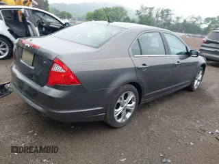 2012 Ford Fusion SE z VIN 3FAHP0HA2CR331457, wystawiony jako IAAI lot #42442796 z przebiegiem 134 903 mil mil oraz . Historia ofert i sprzedaży dostępna na DreamBid. Obrazek 4.