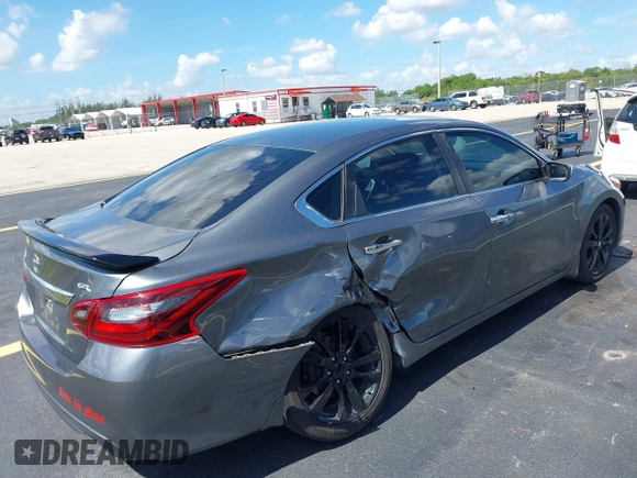 2017 Nissan Altima S with VIN 1N4AL3AP0HC297523, listed as a IAAI auction lot 42525818 with 162,767 mi miles and . Bid and sale history available at DreamBid. Image 4.
