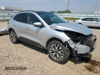 2020 Ford Escape Titanium with VIN 1FMCU9J98LUA78182, listed as a Copart auction lot 60477635 with 76,117 mi miles and Salvage title. Bid and sale history available at DreamBid. Image 4.