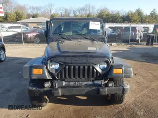 2006 Jeep Wrangler Sport with VIN 1J4FA49SX6P733671, listed as a IAAI auction lot 41779611 with 189,701 mi miles and . Bid and sale history available at carsss.com. Image 12.
