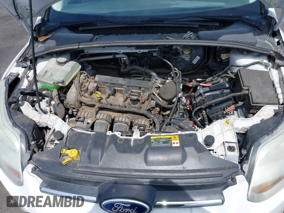 2012 Ford Focus SE with VIN 1FAHP3F24CL462319, listed as a IAAI auction lot 41981509 with 124,831 mi miles. Bid and sale history available at carsss.com. Image 10.