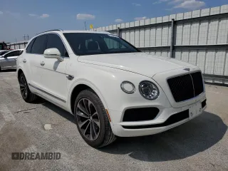 2019 Bentley Bentayga V8 z VIN SJAAM2ZV0KC026362, wystawiony jako Copart lot #54059393 z przebiegiem 31 530 mil mil oraz . Historia ofert i sprzedaży dostępna na DreamBid. Obrazek 4.