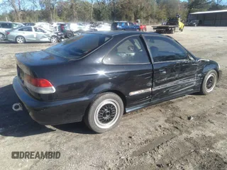 1998 Honda Civic DX with VIN 1HGEJ6122WL069075, listed as a IAAI auction lot 40932423 with 125,277 mi miles. Bid and sale history available at carsss.com. Image 4.