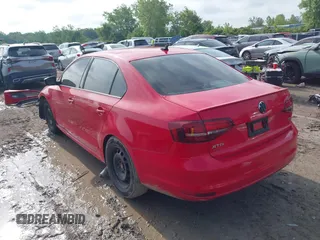 2016 Volkswagen Jetta Sport z VIN 3VWD17AJ5GM270036, wystawiony jako IAAI lot #42527954 z przebiegiem 142 008 mil mil oraz . Historia ofert i sprzedaży dostępna na DreamBid. Obrazek 3.