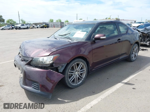 2013 Scion tC with VIN JTKJF5C7XD3064777, listed as a IAAI auction lot 42008710 with 147,808 mi miles. Bid and sale history available at carsss.com. Image 2.