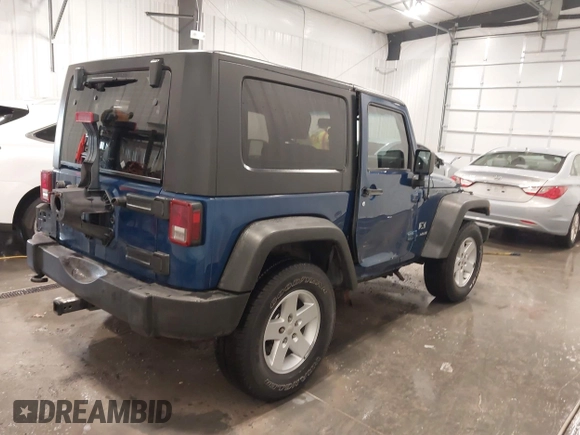 2009 Jeep Wrangler X with VIN 1J4FA24149L728979, listed as a IAAI auction lot 41905455 with 144,221 mi miles and . Bid and sale history available at DreamBid. Image 4.