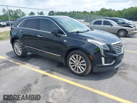 2017 Cadillac XT5 Platinum AWD z VIN 1GYKNFRS9HZ125677, wystawiony jako IAAI lot #42366784 z przebiegiem 152 116 mil mil oraz . Historia ofert i sprzedaży dostępna na DreamBid. Obrazek 1.