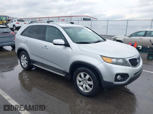 2012 Kia Sorento LX with VIN 5XYKTDA61CG303393, listed as a IAAI auction lot 41137220 with 123,474 mi miles. Bid and sale history available at carsss.com. Image 1.