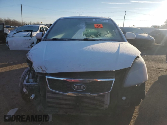 2010 Kia Rio LX with VIN KNADH4A35A6691869, listed as a Copart auction lot 42025785 with 126,381 mi miles and Salvage Title. Bid and sale history available at carsss.com. Image 5.