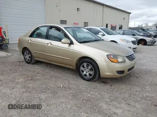 2009 Kia Spectra EX with VIN KNAFE221795665455, listed as a IAAI auction lot 41826035 with 163,073 mi miles. Bid and sale history available at carsss.com. Image 1.
