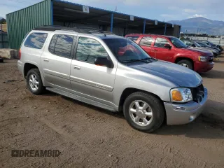 2005 GMC Envoy SLT with VIN 1GKET16M656181157, listed as a Copart auction lot 72980874 with 243,975 mi miles and Salvage Title. Bid and sale history available at DreamBid. Image 4.