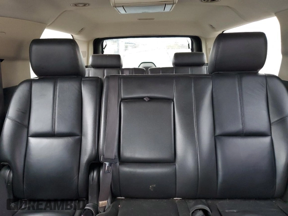 2013 Chevrolet Suburban LT with VIN 1GNSKJE77DR131188, listed as a Copart auction lot 52880375 with 147,278 mi miles and Salvage Title. Bid and sale history available at DreamBid. Image 10.