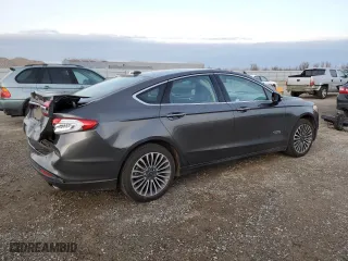 2017 Ford Fusion Energi SE with VIN 3FA6P0PU3HR354658, listed as a Copart auction lot 71824902 with 67,618 mi miles. Bid and sale history available at carsss.com. Image 3.