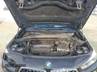 2020 BMW X2 xDrive28i with VIN WBXYJ1C02L5P31038, listed as a IAAI auction lot 41338219 with 72,854 mi miles. Bid and sale history available at carsss.com. Image 10.