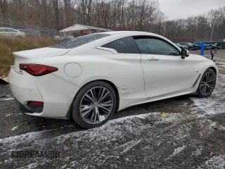 2017 Infiniti Q60 Premium with VIN JN1CV7EL9HM320869, listed as a Copart auction lot 84380414 with 99,797 mi miles and Salvage title. Bid and sale history available at DreamBid. Image 3.