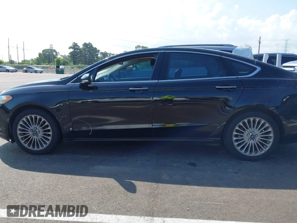 2016 Ford Fusion Titanium with VIN 3FA6P0K90GR333848, listed as a IAAI auction lot 42728138 with 147,864 mi miles and . Bid and sale history available at DreamBid. Image 14.