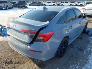 2024 Honda Civic Sport with VIN 2HGFE2F59RH539303, listed as a IAAI auction lot 41417721 with 7,240 mi miles and . Bid and sale history available at DreamBid. Image 4.