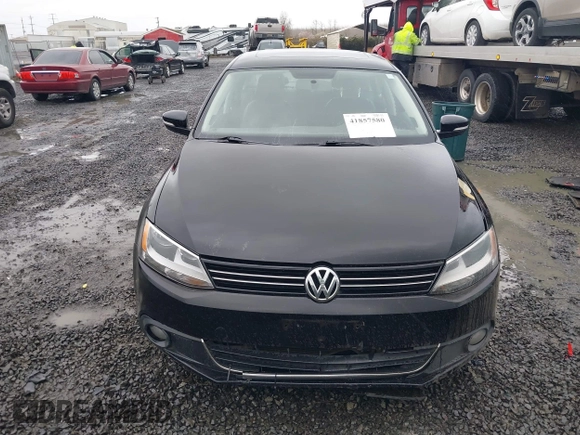 2014 Volkswagen Jetta TDI w/Premium with VIN 3VWLL7AJ1EM406360, listed as a IAAI auction lot 41857580 with 93,333 mi miles and . Bid and sale history available at DreamBid. Image 12.