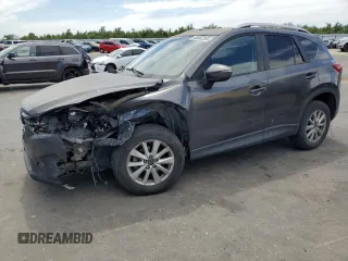 2016 Mazda CX-5 Sport with VIN JM3KE2BY2G0807016, listed as a Copart auction lot 63462255 with 112,226 mi miles and Salvage title. Bid and sale history available at DreamBid. Image 1.