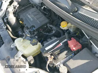 2014 Chevrolet Sonic RS with VIN 1G1JG5SBXE4230911, listed as a IAAI auction lot 40725104 with 122,433 mi miles and . Bid and sale history available at DreamBid. Image 14.