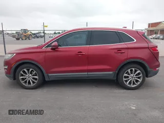 2015 Lincoln MKC with VIN 5LMCJ1A97FUJ30994, listed as a IAAI auction lot 42159219 with 180,802 mi miles. Bid and sale history available at carsss.com. Image 14.