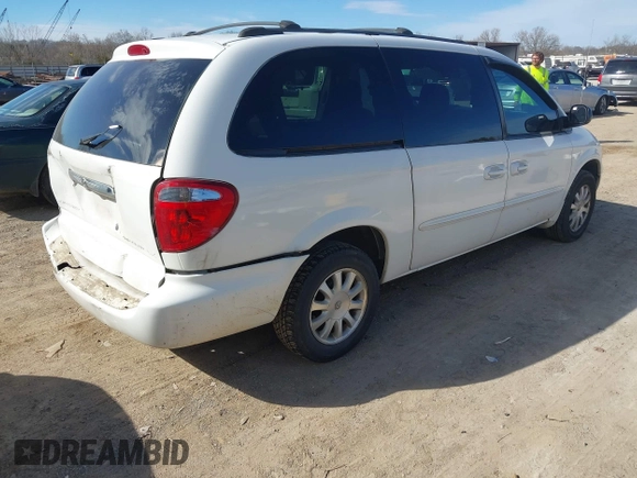 2003 Chrysler Town & Country LX with VIN 2C4GP44L33R117314, listed as a IAAI auction lot 41674437 with Not Provided miles and . Bid and sale history available at DreamBid. Image 4.