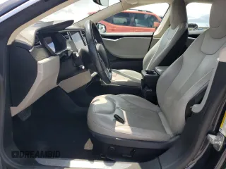 2014 Tesla Model S 60 with VIN 5YJSA1H12EFP61355, listed as a Copart auction lot 59709065 with 109,446 mi miles and Salvage title. Bid and sale history available at DreamBid. Image 7.