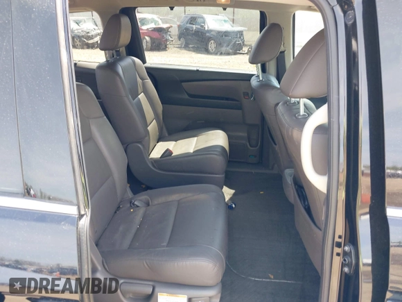 2014 Honda Odyssey Touring with VIN 5FNRL5H94EB079518, listed as a IAAI auction lot 42095098 with 141,019 mi miles and . Bid and sale history available at DreamBid. Image 8.