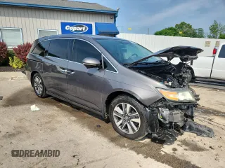2015 Honda Odyssey Touring Elite with VIN 5FNRL5H98FB125532, listed as a Copart auction lot 60656485 with 184,421 mi miles and Non repairable. Bid and sale history available at DreamBid. Image 4.