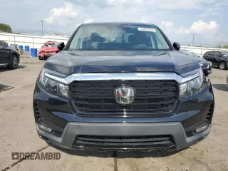 2022 Honda Ridgeline RTL-E with VIN 5FPYK3F7XNB023787, listed as a Copart auction lot 66883515 with 49,786 mi miles and Salvage title. Bid and sale history available at DreamBid. Image 5.