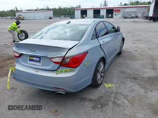 2012 Hyundai Sonata SE with VIN 5NPEC4AB9CH475853, listed as a IAAI auction lot 42084329 with 143,146 mi miles and . Bid and sale history available at carsss.com. Image 12.