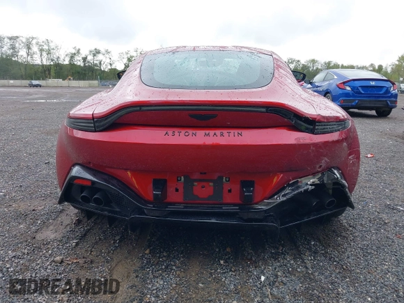 2023 Aston Martin Vantage z VIN SCFSMGAW8PGN08275, wystawiony jako IAAI lot #40460970 z przebiegiem 2 602 mil mil oraz . Historia ofert i sprzedaży dostępna na DreamBid. Obrazek 17.