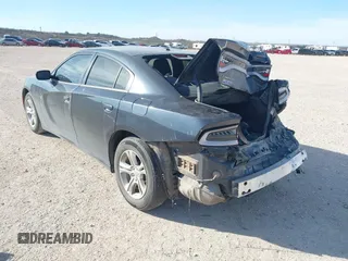 2019 Dodge Charger SXT with VIN 2C3CDXBG2KH658121, listed as a IAAI auction lot 41781901 with 125,634 mi miles. Bid and sale history available at carsss.com. Image 3.
