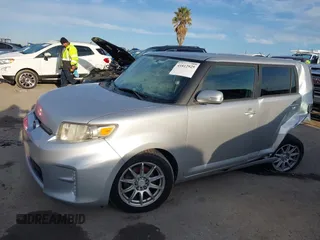 2013 Scion xB with VIN JTLZE4FE2DJ047490, listed as a IAAI auction lot 41812925 with 154,191 mi miles. Bid and sale history available at carsss.com. Image 2.