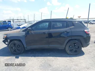 2019 Jeep Compass Latitude with VIN 3C4NJCBB9KT613016, listed as a IAAI auction lot 42570739 with 41,944 mi miles and . Bid and sale history available at DreamBid. Image 14.