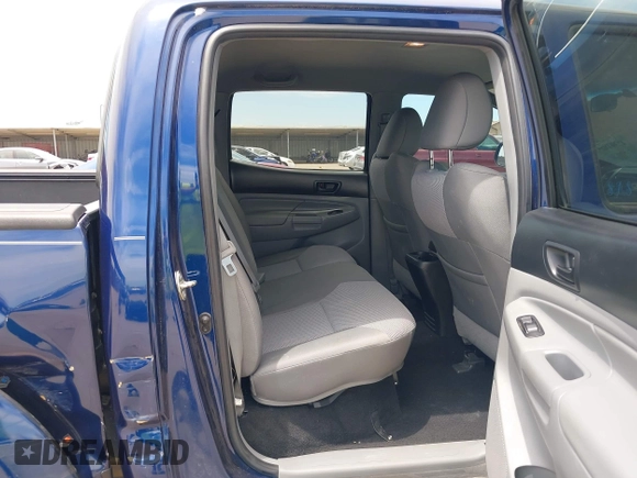 2014 Toyota Tacoma with VIN 3TMLU4EN6EM148851, listed as a IAAI auction lot 42307954 with 71,784 mi miles and . Bid and sale history available at DreamBid. Image 8.
