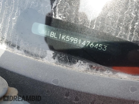 2011 Mazda 3 S Sport z VIN JM1BL1K59B1476453, wystawiony jako Copart lot #57753365 z przebiegiem 120 432 mil mil oraz Czysty tytuł • Clean title. Historia ofert i sprzedaży dostępna na DreamBid. Obrazek 12.