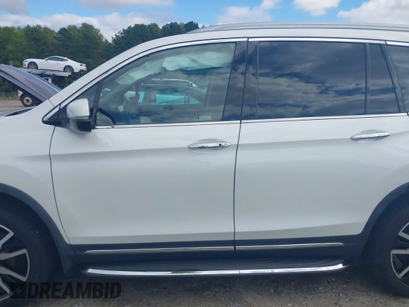 2020 Honda Pilot Elite with VIN 5FNYF6H08LB014288, listed as a IAAI auction lot 40496871 with 57,921 mi miles and . Bid and sale history available at DreamBid. Image 14.