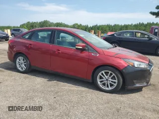 2015 Ford Focus SE with VIN 1FADP3F24FL311323, listed as a Copart auction lot 62958995 with 140,097 mi miles and Clean title. Bid and sale history available at DreamBid. Image 4.