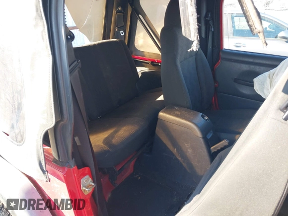 2005 Jeep Wrangler X with VIN 1J4FA39S95P385581, listed as a IAAI auction lot 41333338 with 150,010 mi miles and . Bid and sale history available at DreamBid. Image 8.