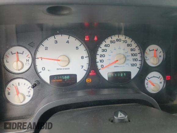 2002 Dodge 1500 z VIN 1D7HA16K52J214340, wystawiony jako Copart lot #61158705 z przebiegiem 279 568 mil mil oraz Szkoda całkowita • Salvage title. Historia ofert i sprzedaży dostępna na DreamBid. Obrazek 9.