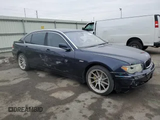 2003 BMW 7 Series 745Li with VIN WBAGN63433DR15033, listed as a Copart auction lot 41573015 with 76,723 mi miles and Salvage Title. Bid and sale history available at carsss.com. Image 4.