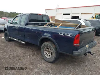 2003 Ford F-150 XL with VIN 1FTRX18L63NB59927, listed as a IAAI auction lot 41842559 with 1 mi miles. Bid and sale history available at carsss.com. Image 3.