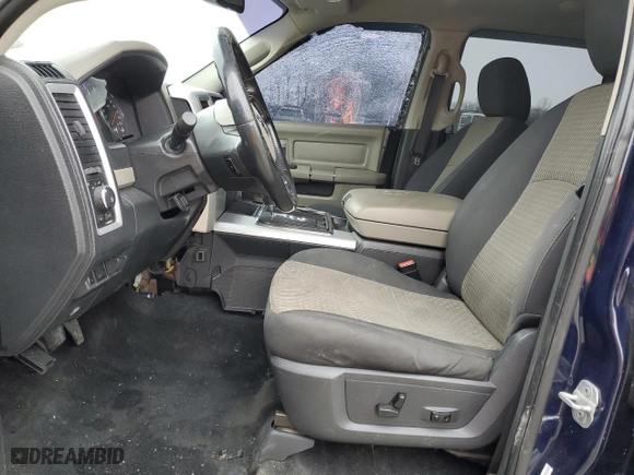 2012 Ram 1500 Outdoorsman with VIN 1C6RD7LTXCS161269, listed as a Copart auction lot 45210505 with 144,156 mi miles and Salvage Title. Bid and sale history available at carsss.com. Image 7.