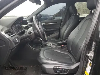2018 BMW X1 xDrive28i with VIN WBXHT3C31J5F89068, listed as a Copart auction lot 52266655 with 145,375 mi miles and Clean Title. Bid and sale history available at carsss.com. Image 7.