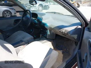 1994 Chevrolet Beretta z VIN 1G1LV15M9RY253342, wystawiony jako IAAI lot #42047160 z przebiegiem 131 763 mil mil oraz . Historia ofert i sprzedaży dostępna na DreamBid. Obrazek 5.
