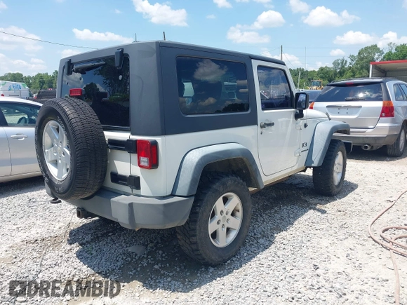 2009 Jeep Wrangler X with VIN 1J4FA24149L781794, listed as a IAAI auction lot 42352426 with 99,128 mi miles and . Bid and sale history available at DreamBid. Image 4.